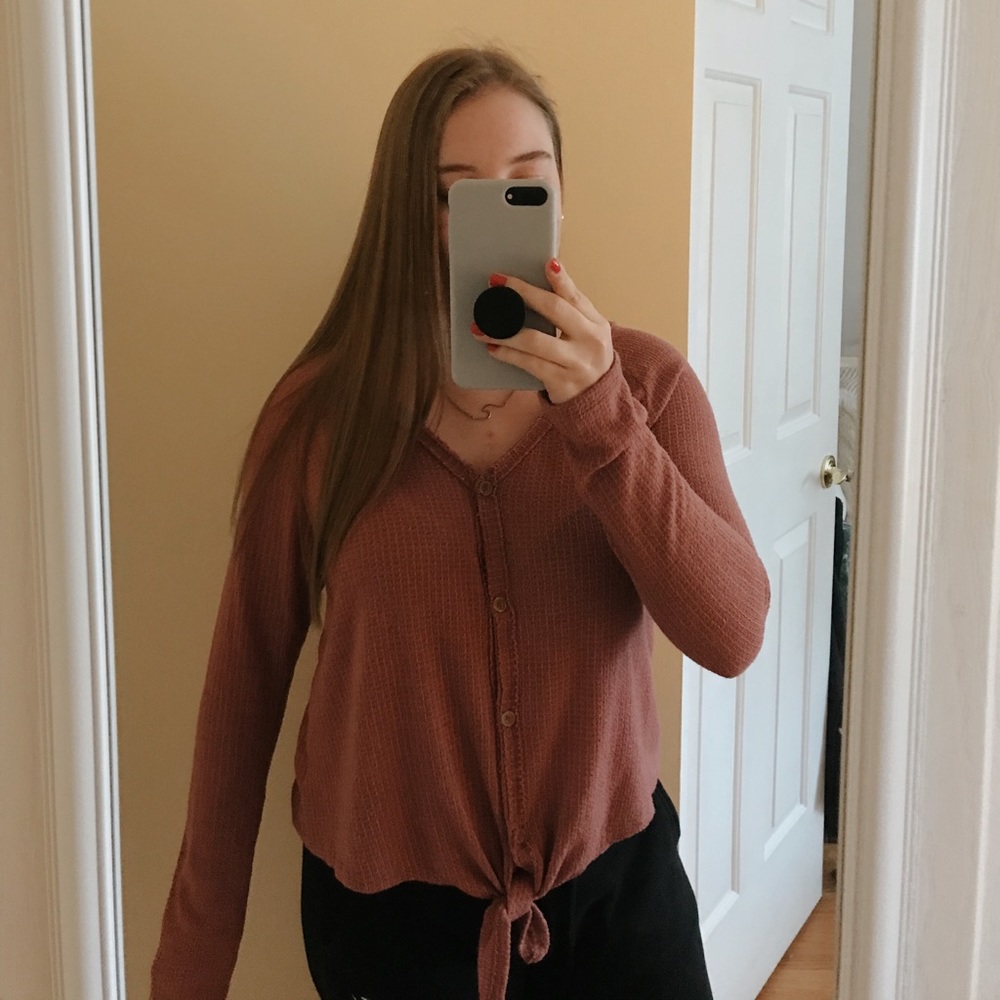 pink button down top